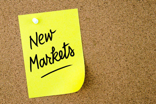 istock New Markets text written on yellow paper note 639762648