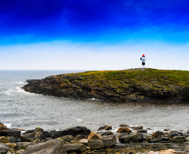 istock Horizontal vivid Norway right aligned lighthouse  on island land 639762998