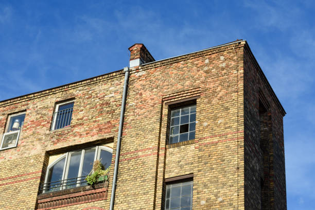 istock romantic brick house against blue sky 639766136