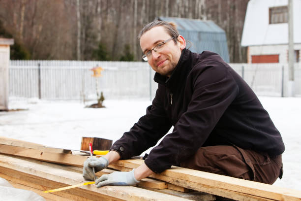 istock Man sawing wood 639766286