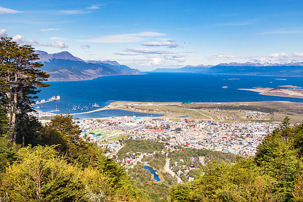 View of Ushuaia and Beagle Channel Tierra del Fuego Argentina Stock photo of the town of Ushuaia and the Beagle Channel, located in Tierra del Fuego province, Argentina, as seen from above, during Summer. ushuaia stock pictures, royalty-free photos & images