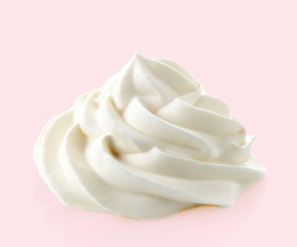 whipped sweet cream whipped cream on a pink background ice pie stock pictures, royalty-free photos & images