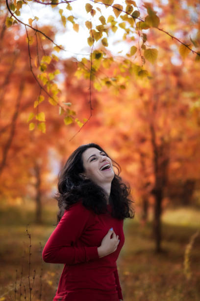 istock Young lady in autumn forest 639773608