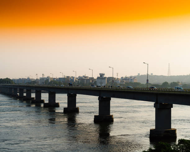 istock Horizontal vivid orange sunset indian bridge background backdrop 639774142