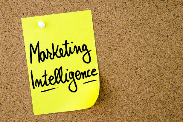 istock Marketing Intelligence text written on yellow paper note 639777544