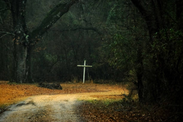 istock Lonely Cross at Dead End Curve 639782160