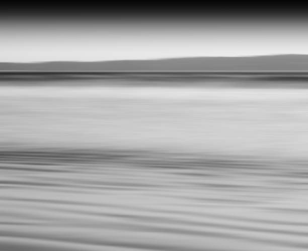 istock Horizontal black and white ocean milk motion blur abstraction ba 639782384