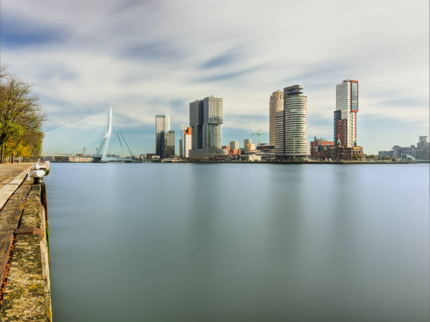 Spectacular panoramic view of modern city of Rotterdam and smooth river stock photo