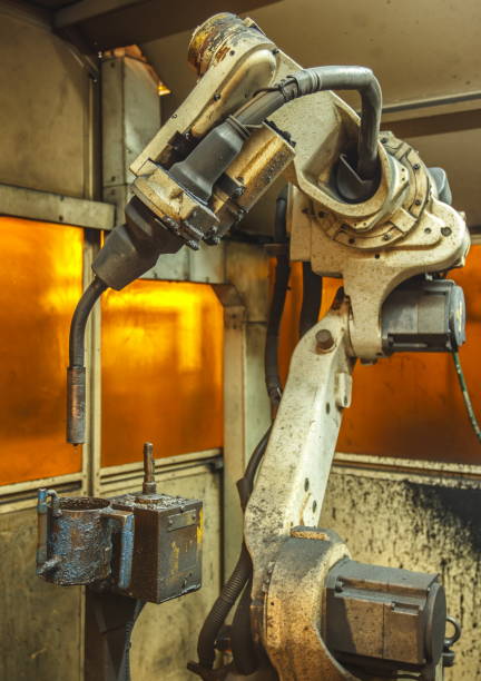 istock Robots welding team in the automotive 639785356