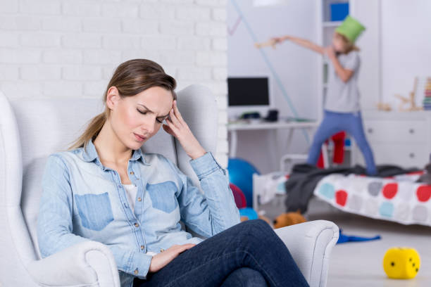 istock Tired mother of hyperactive child 639794668
