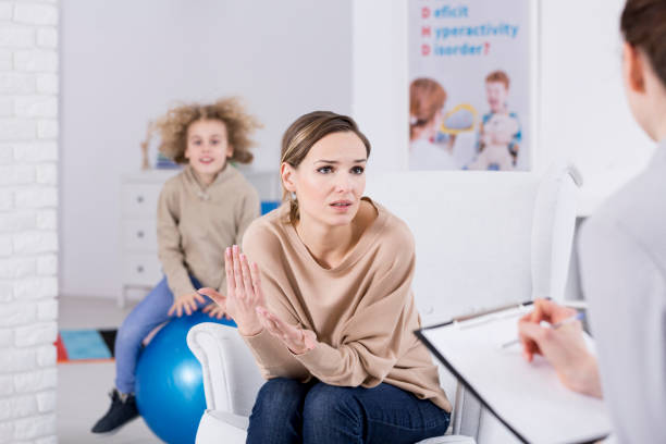 istock Mother helping her ADHD child 639794674