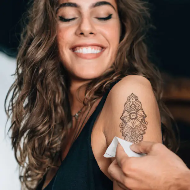Photo of Girl with temporary tattoo
