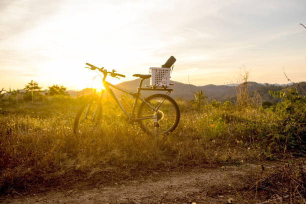 istock Evening recreation with bicycle with sunset and dramatic sky. 639799756