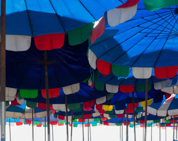 istock Patterns of colorful beach umbrellas 639800864