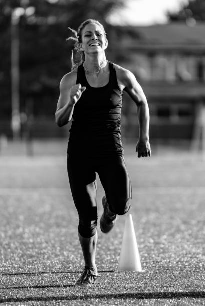 istock Female athlete running, cross training, black and white 639802856