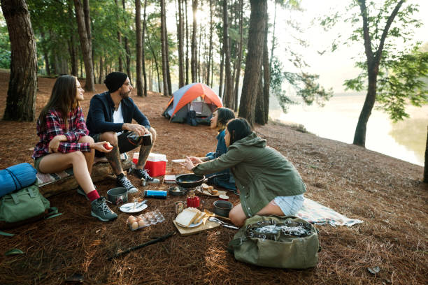 istock Friends Camping Eating Food Concept 639805332