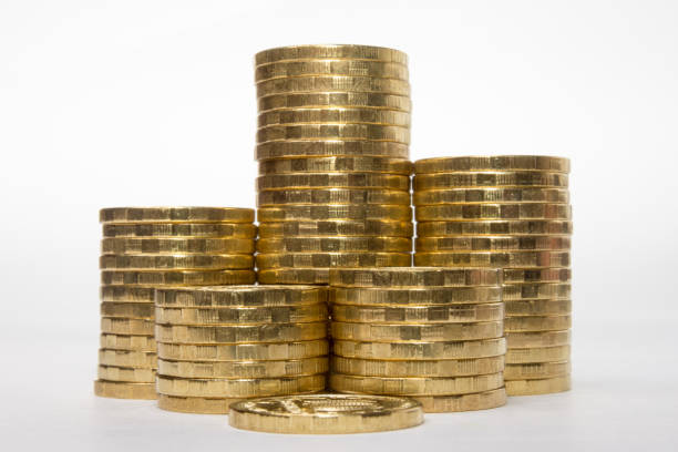 istock Six stacks of coins increasing in height on white background 639812100