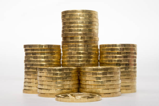istock Six stacks of coins increasing height symmetrically on white background 639812256