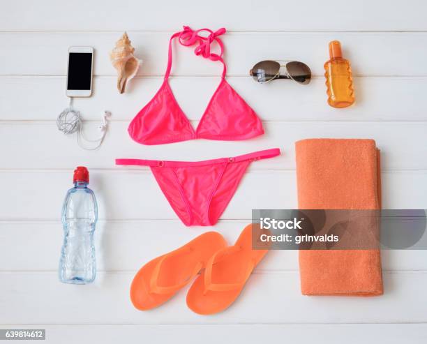 Flat Lay Items For Sunbathing Stock Photo - Download Image Now - Bikini, Flip-Flop, Summer