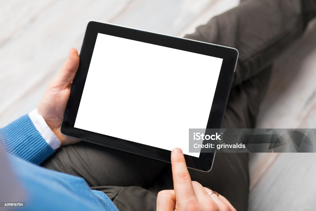 Person using tablet computer Adult Stock Photo