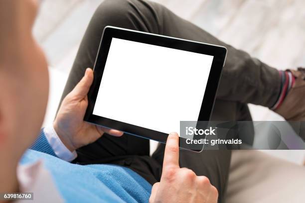 Man Using Tablet Computer Stock Photo - Download Image Now - Digital Tablet, Computer Monitor, Device Screen