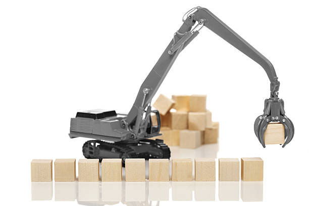 istock Crane and blank wooden  cubes 639817960