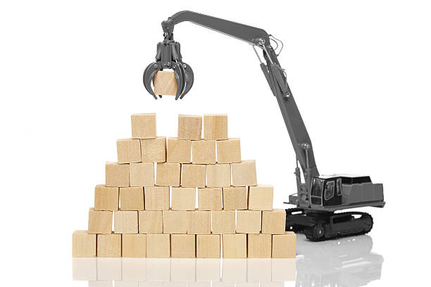 istock Crane and blank wooden  cubes 639818040