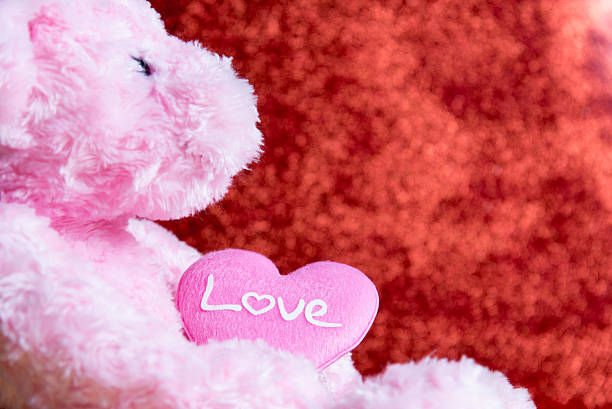 istock teddy Bear with Heart on red background,concept valentine 639819762