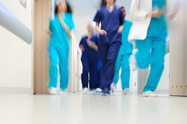 istock Team of doctors in a great hurry 639820436