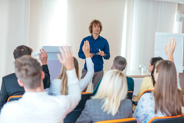 istock Moderator talking to participants on seminar 639822294