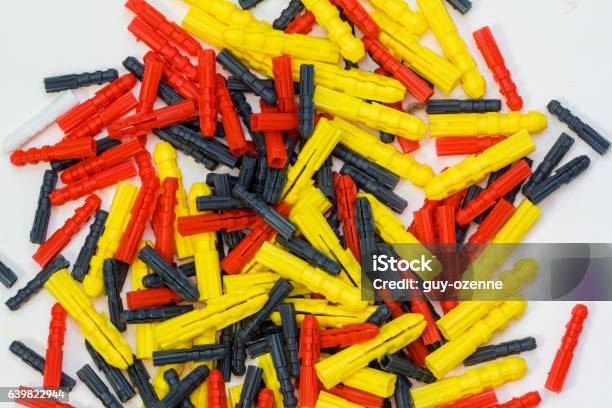 Assortment Of Plastic Dowels Stock Photo - Download Image Now - Art And Craft, Brick, Brick Wall