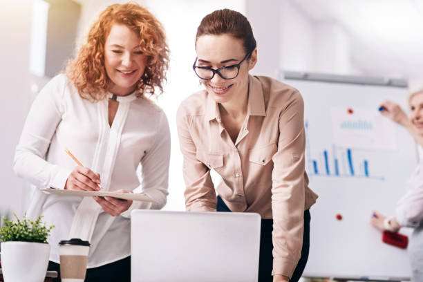 istock Delighted involved colleagues collaborating in the office 639823682