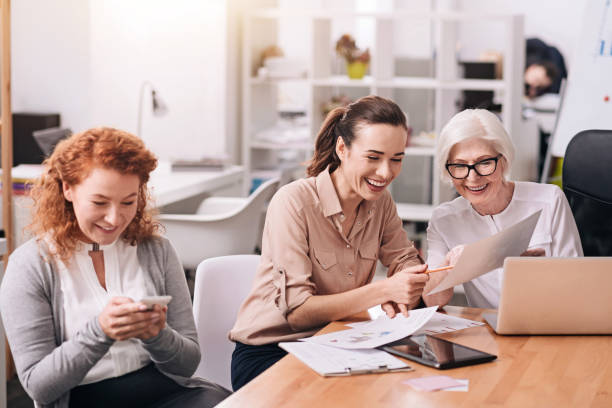 istock Involved positive businesswomen creating the project at work 639825292