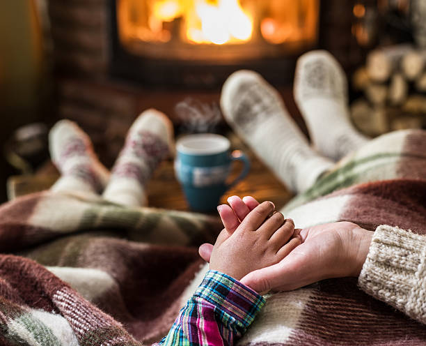 istock Warming and relaxing near fireplace. 639826222