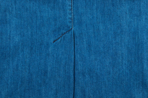 istock Jeans texture with seams. Blue seam on  denim. 639828194