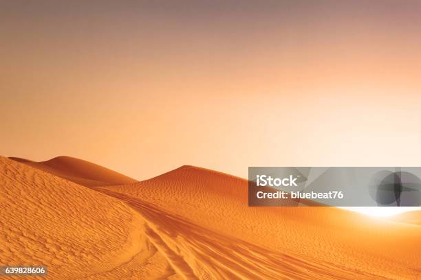 Desert Sand Dunes Road At Sunset Stock Photo - Download Image Now - Landscape - Scenery, Libya, Desert Area