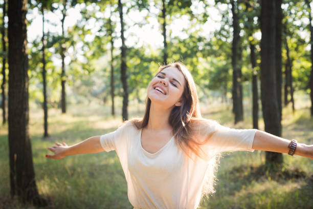istock female i enjoying the sun in park 639830972
