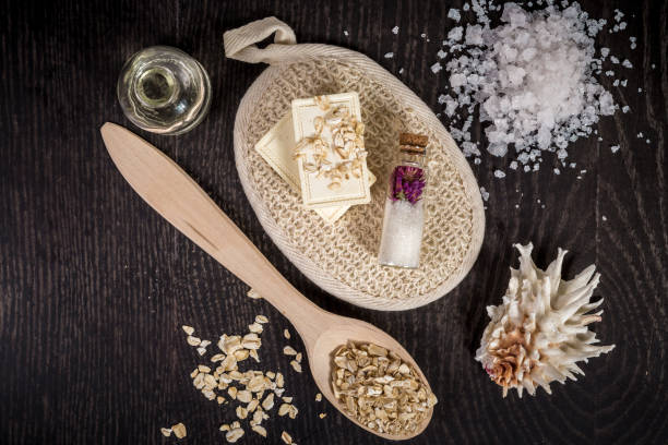 istock cosmetics for spa on dark background top view 639831942