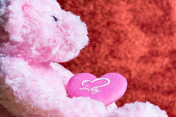istock teddy Bear with Heart on red background,concept valentine 639832950