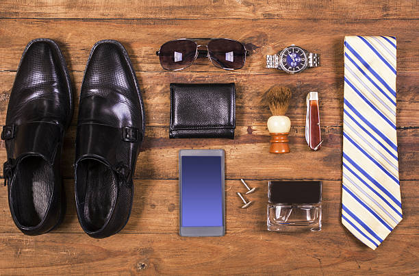 istock Men's accessories organized on table in knolling arrangement 639833652