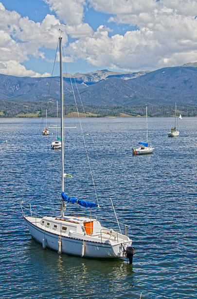 Lake Granby in north central Colorado is surrounded by the Rocky Mountains and lots of beetle kill trees.  It is a summer vacation spot, especially for those who enjoy sailing.