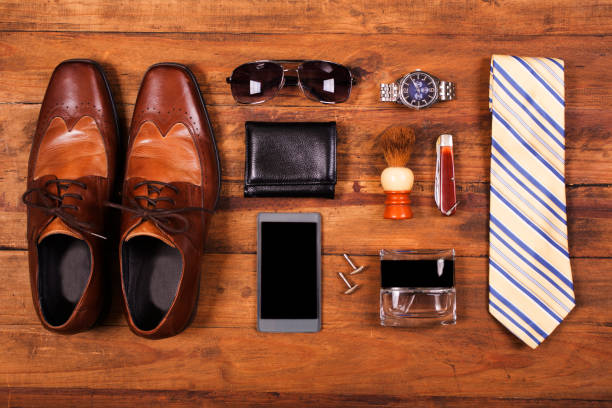 istock Men's accessories organized on table in knolling arrangement 639835544