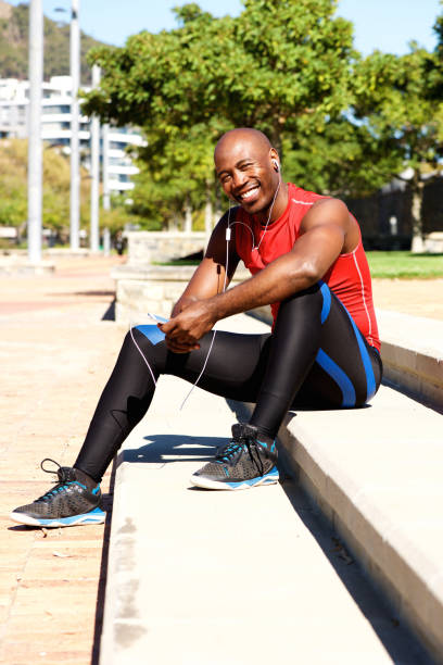 istock Healthy young man taking break from workout outdoors 639836032
