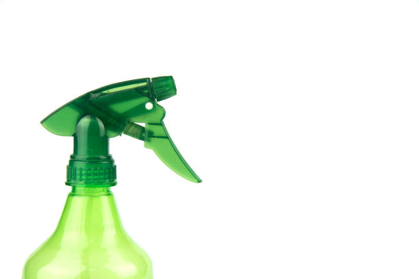 istock Green spray heads water on a white background. 639838124