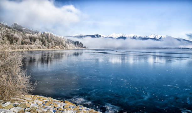 istock Lake Liptovska Mara covered in ice 639838898