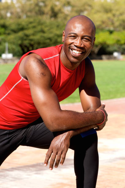 istock Healthy african guy standing outdoors at the park 639839454