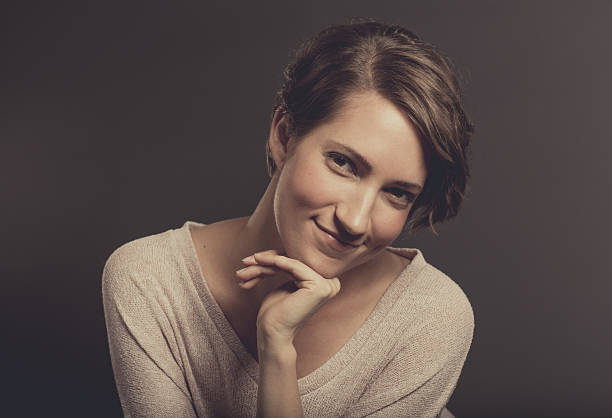 istock Attractive Young Woman Looking at the Camera 639840816