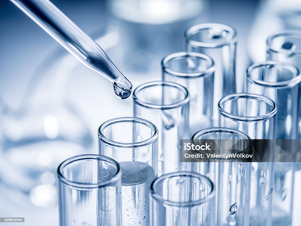 Different laboratory beakers and glassware. Different laboratory beakers and glassware. Monochrome. Test Tube Stock Photo