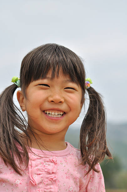 istock Smiling Japanese girl 639845412