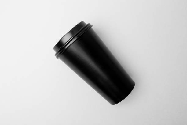 istock Blank black paper cup on the gray background 639845930